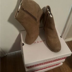 3.25’ wedge booties. Never worn. Had foot surgery and can’t wear this height now